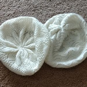 2 White hats that are like beanies